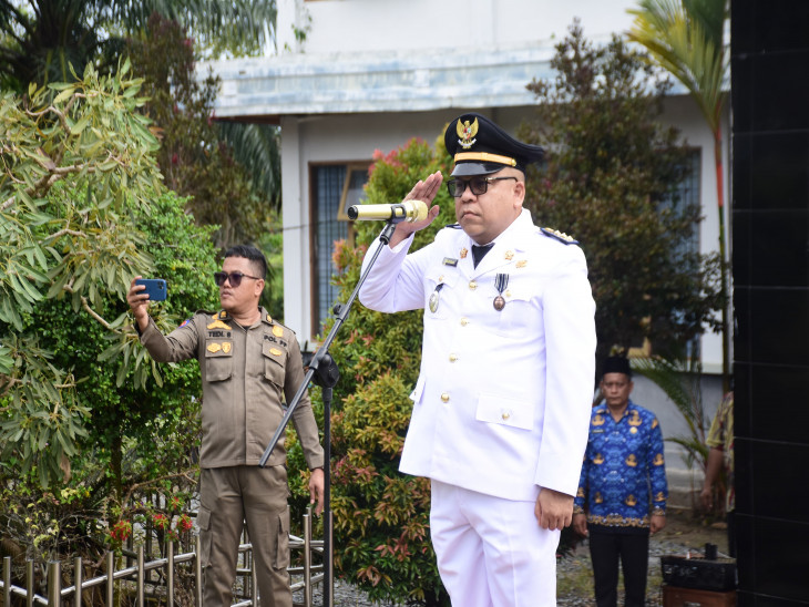 Semangat Otonomi Daerah: Camat Zulfikar Pimpin Upacara Peringatan HUT Otda ke-29 di Kecamatan XIII Koto Kampar